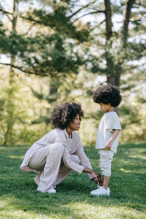 Mother with her son, calm and close — the regulated connection The Grounded Parent's tools help you rebuild after a hard moment.